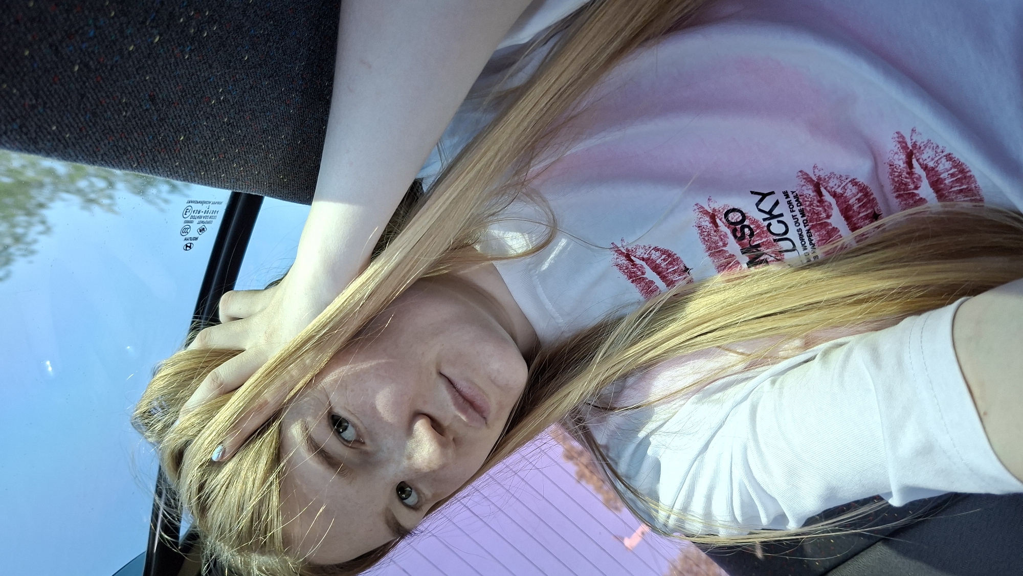 Woman takes car selfies in Большой Букор, Russia