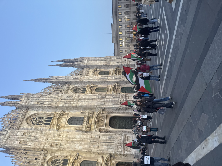 Tourist captures Milan's iconic landmarks during evening hours