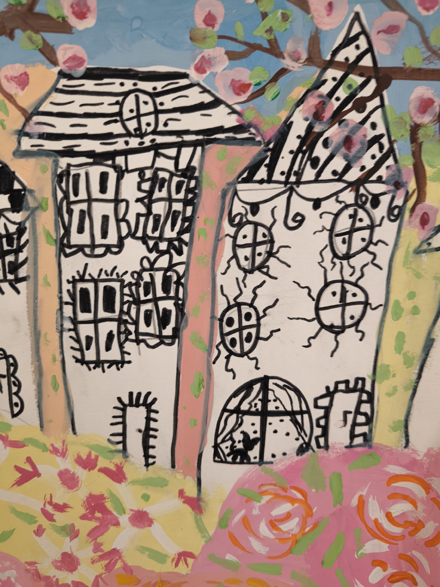 Amateur art displays spotted in Riga featuring house painting, paper flowers