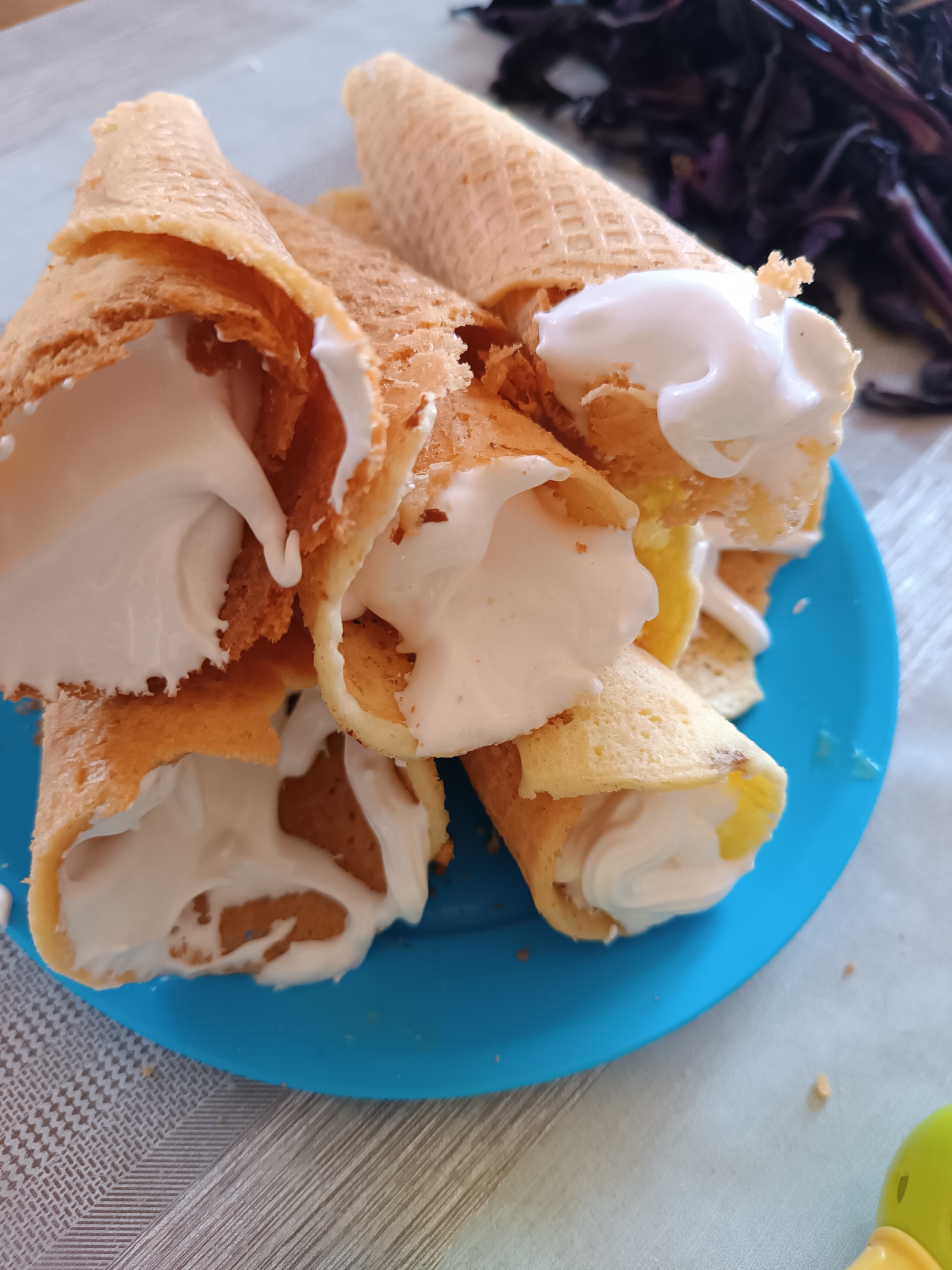 Wafer snacks and a phone screen at a Talin get-together