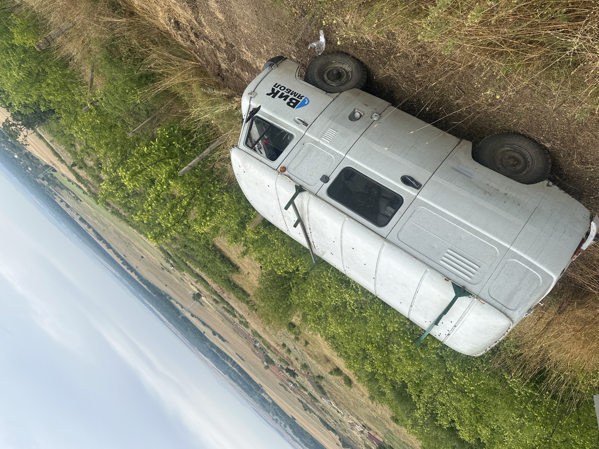 Parked overlooking cultivated fields from a hilltop vantage point