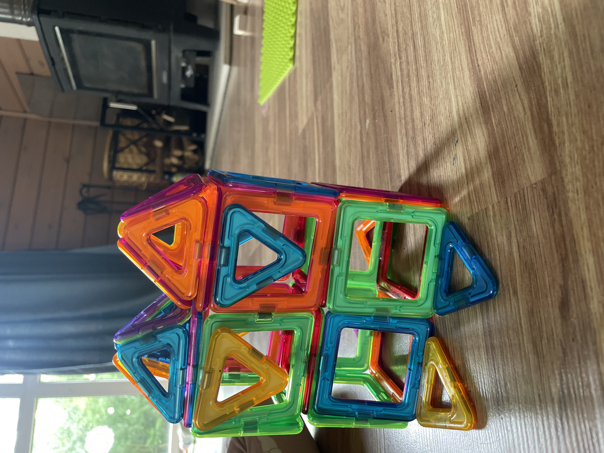 Craft sessions, market goods, and a parked car on a summer day