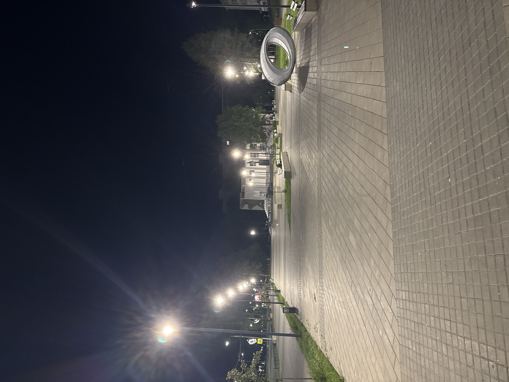 Nighttime scenes documented in Chaikovsky, Russia include portraits, empty spaces
