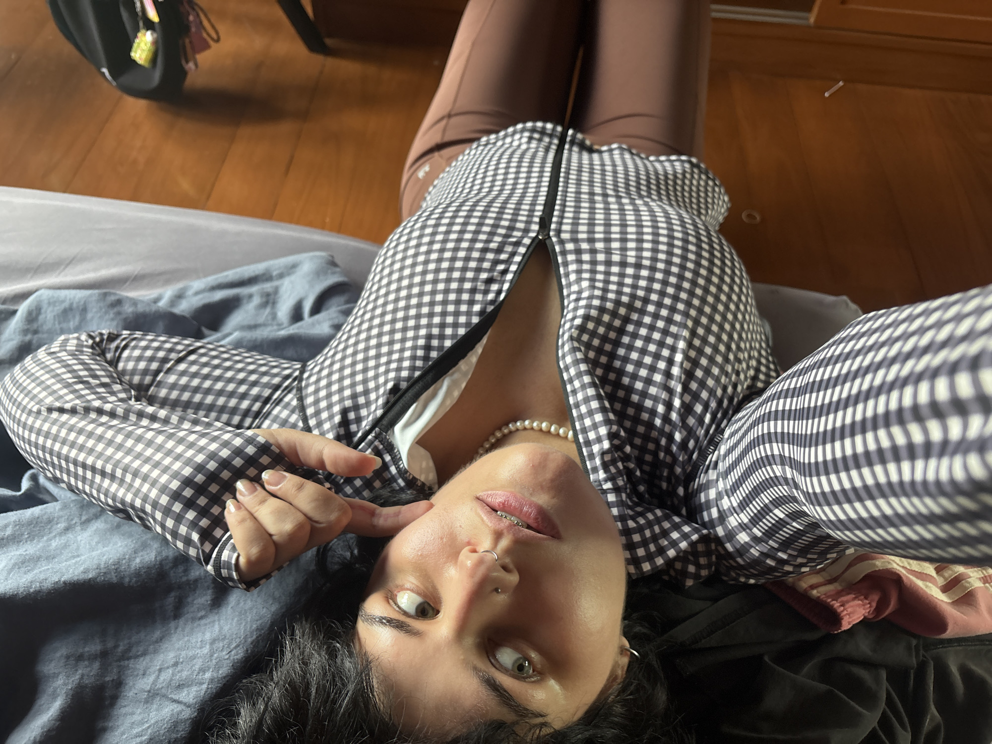 Morning at a Thai residence: selfies, a spirit house, and garden light