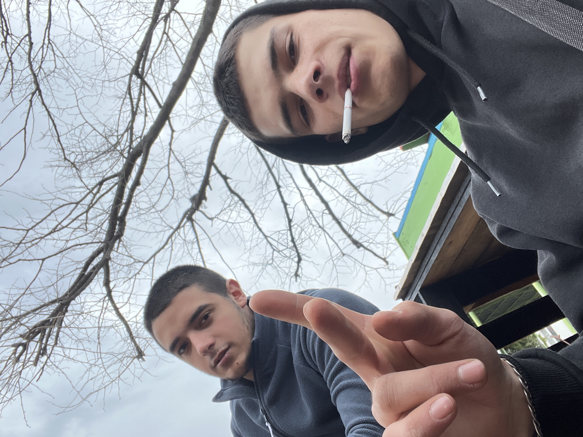 Two young men take selfie in Sopot, Bulgaria