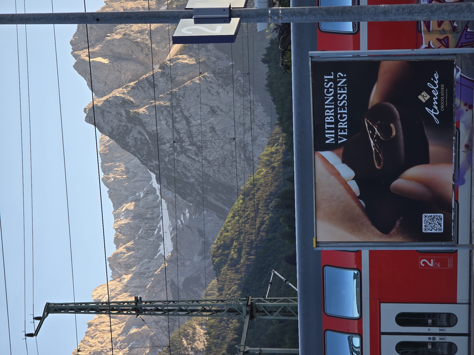 Regional train stop in Garmisch-Partenkirchen with Alpine backdrop