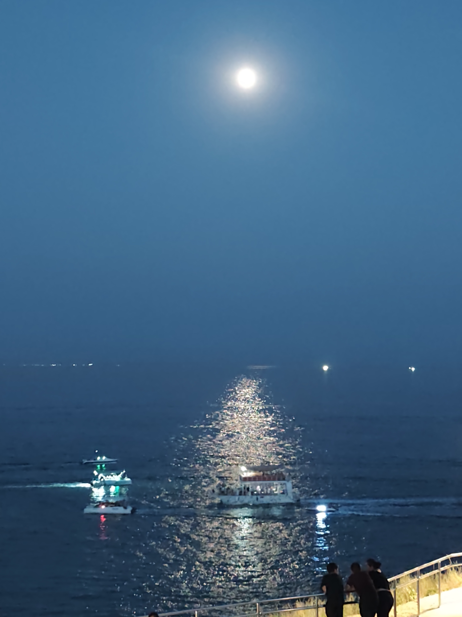 Live concert on Aktau's Caspian waterfront under a full moon