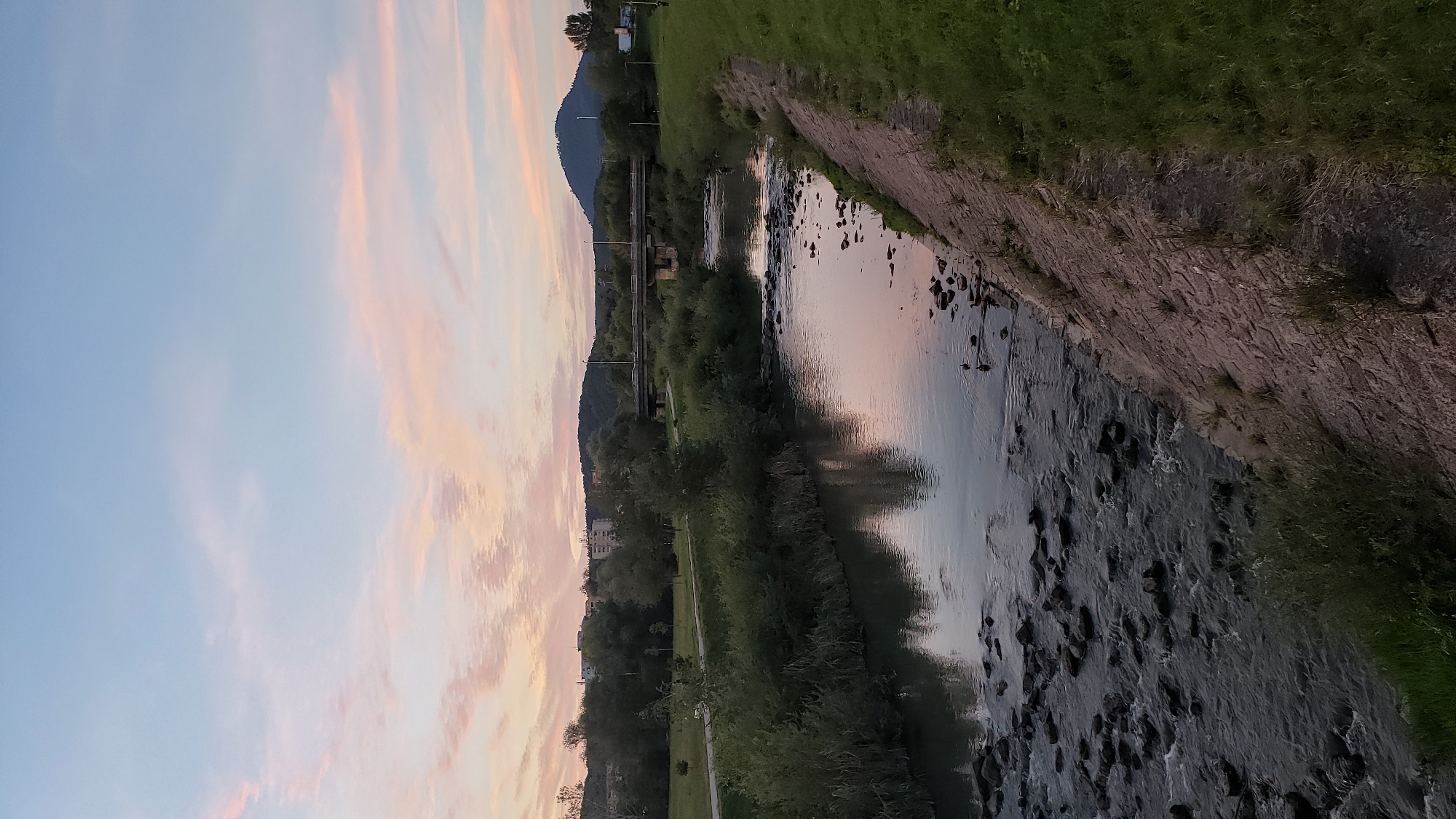 Prešov at dusk: riverside walks, fishing, and a soft summer sky
