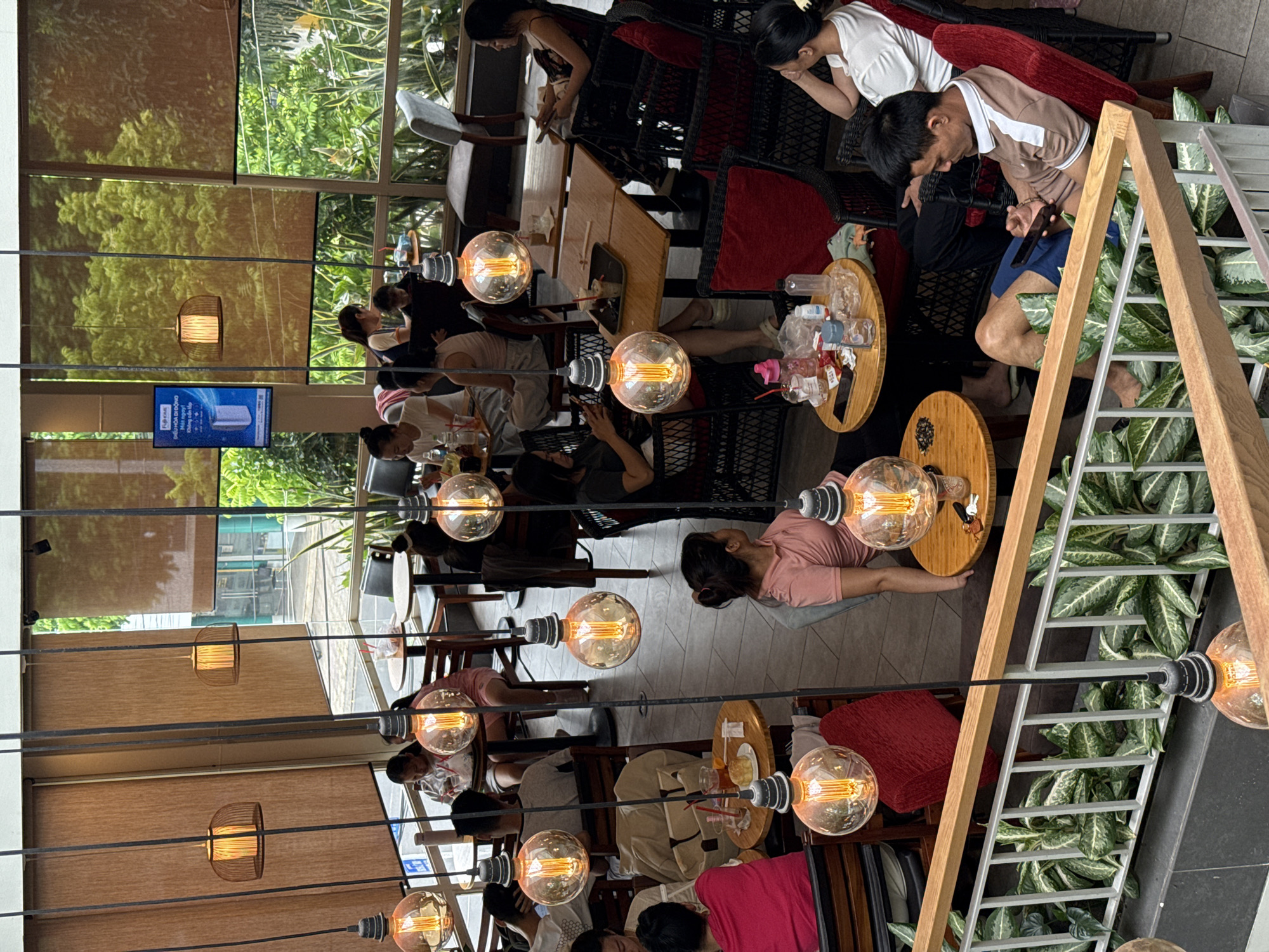 Inside a busy Nha Trang cafe on a tropical afternoon