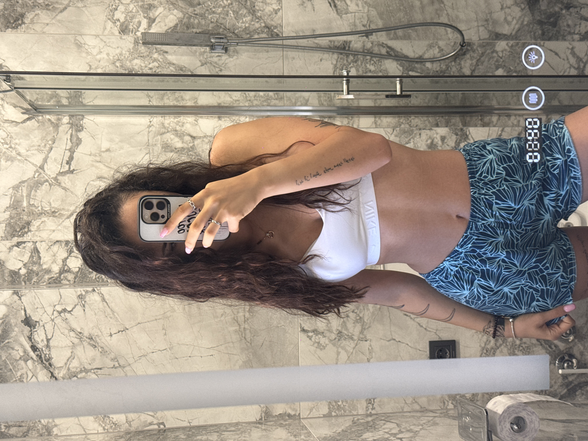 Mirror selfie in workout gear, Shumen bathroom