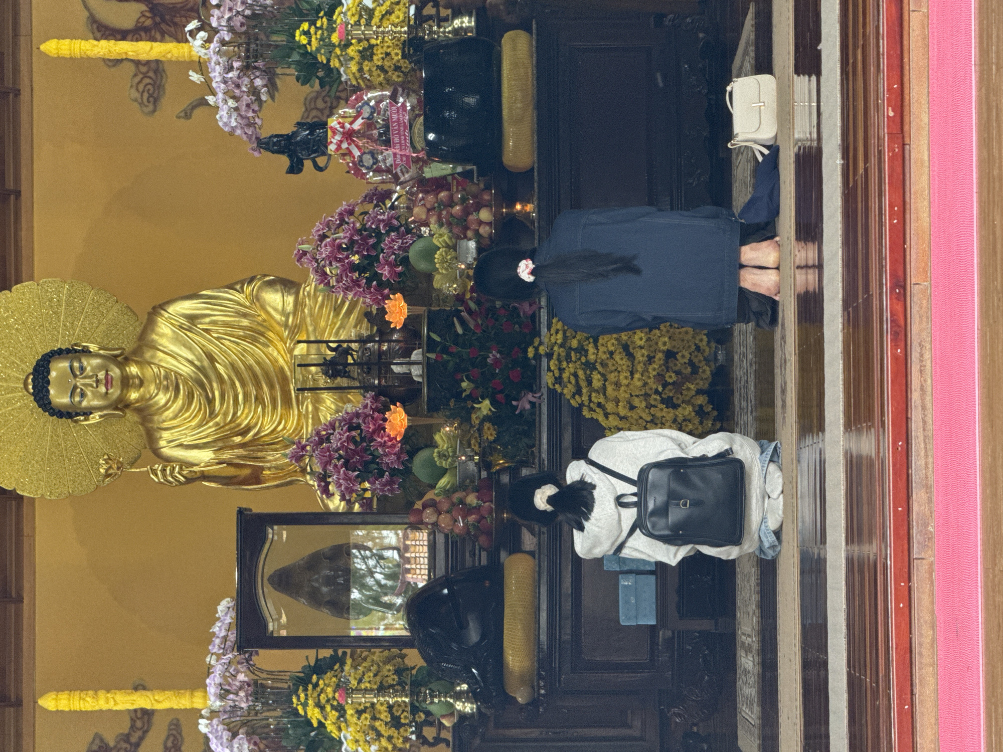 Prayer and strolling at a Buddhist temple in Da Lat