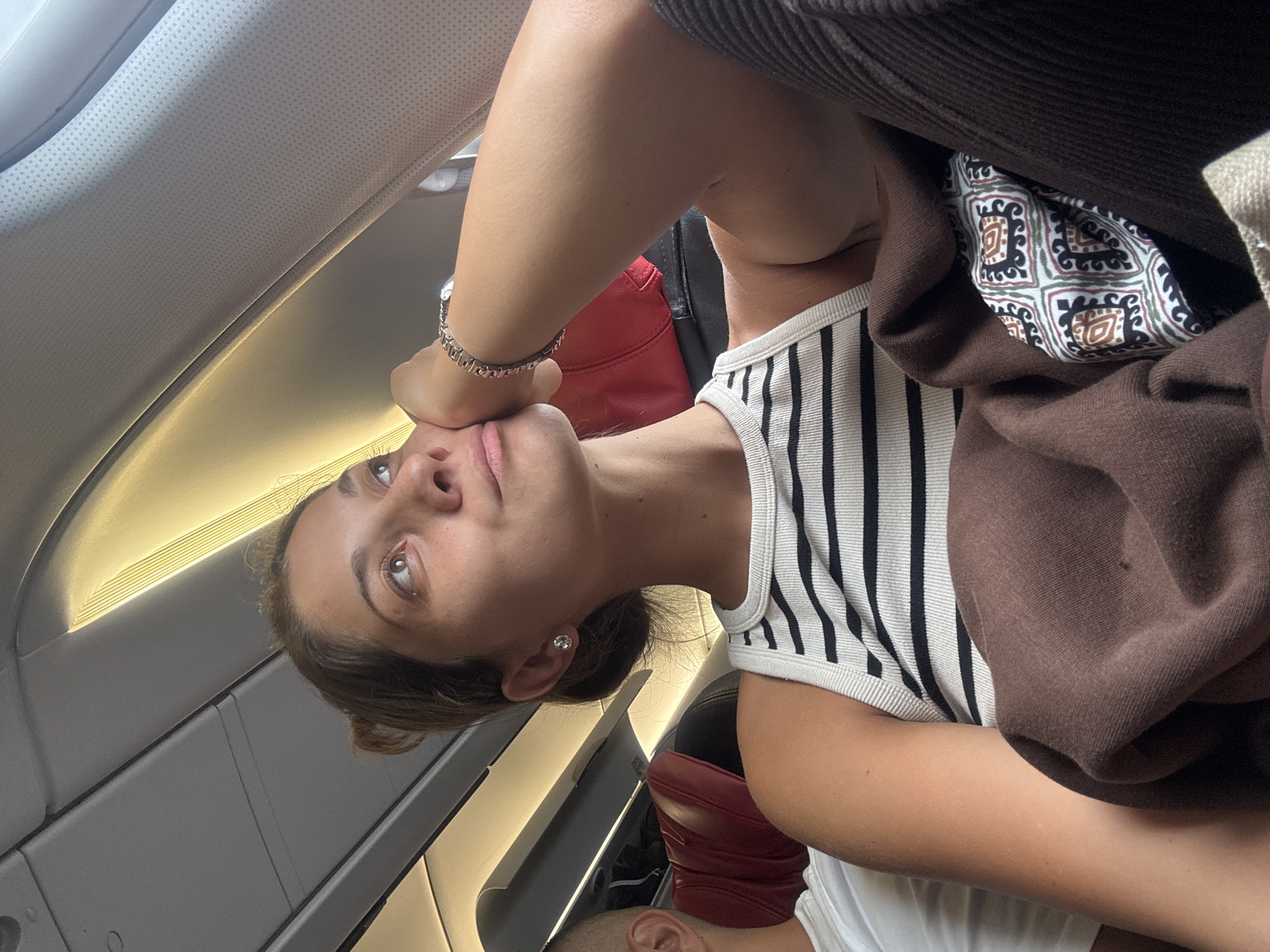 Passengers photograph flight moments aboard aircraft near Sepang, Malaysia