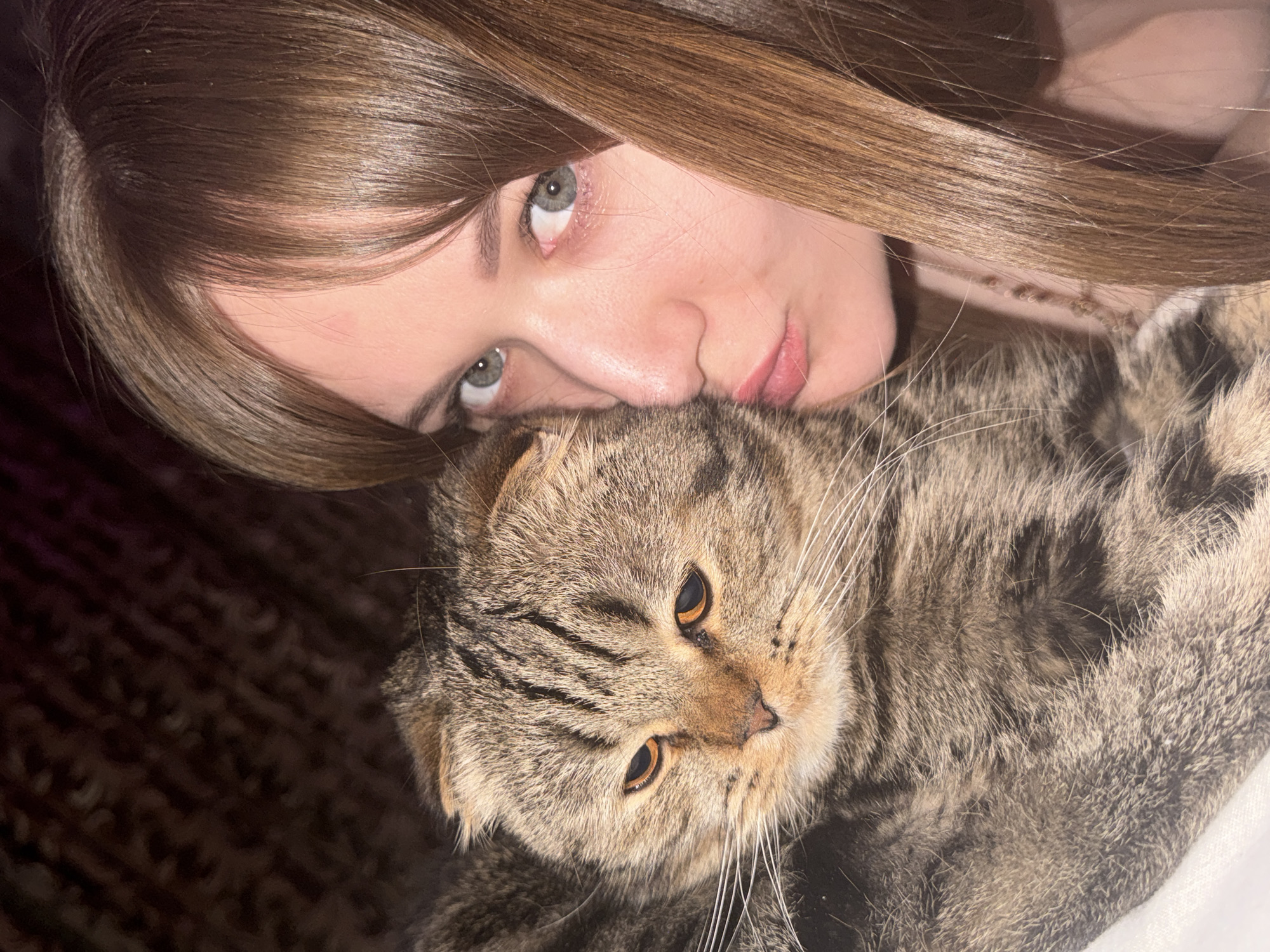 Woman shares tender moment with cat in Chaikovsky