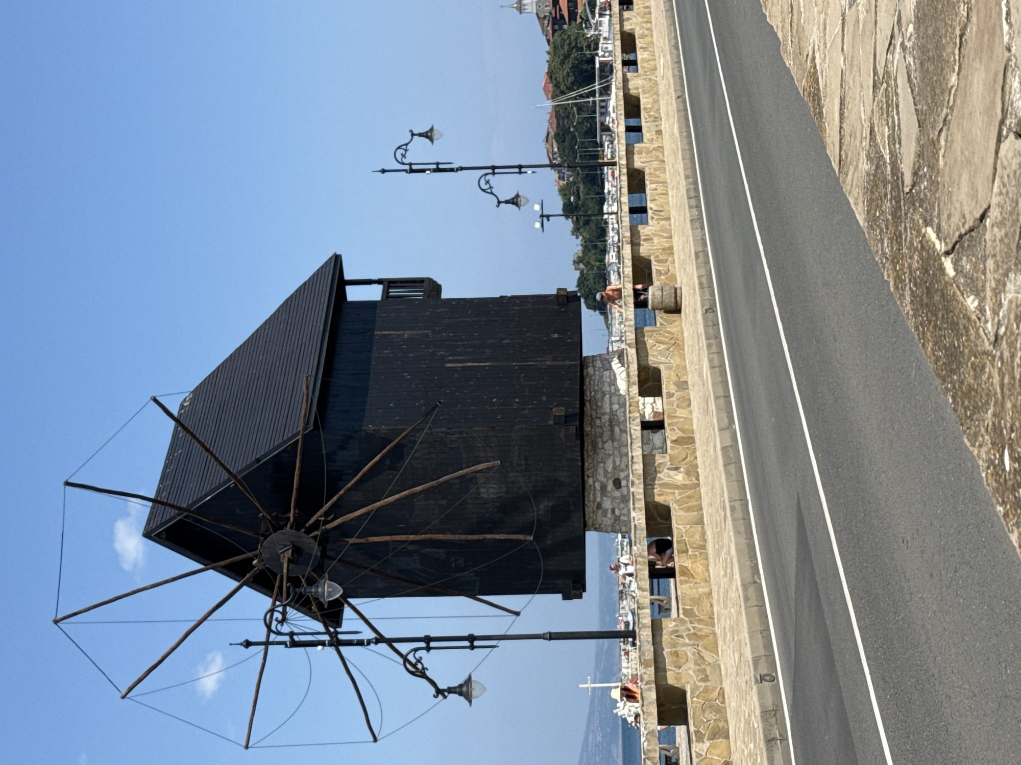 Nesebar waterfront: old windmill meets modern hotel on the Black Sea
