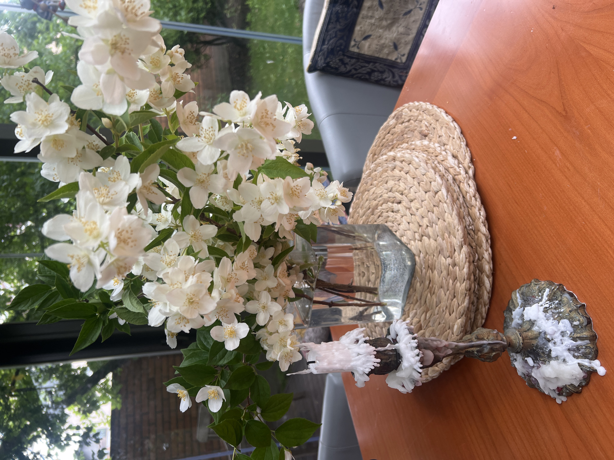 Fresh flowers and a hanging toy decorate a Minsk home interior