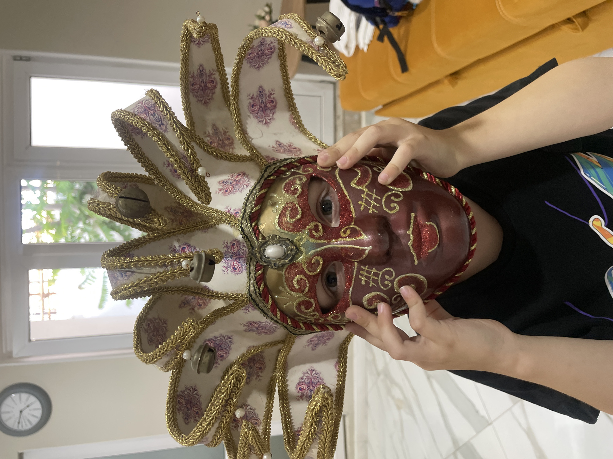 Ornate Venetian jester mask on display in Anapa