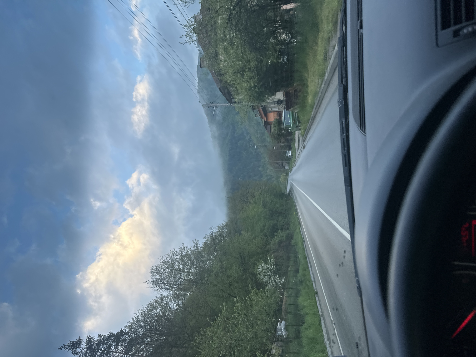 Vehicle travels mountain road near Troyan, Bulgaria