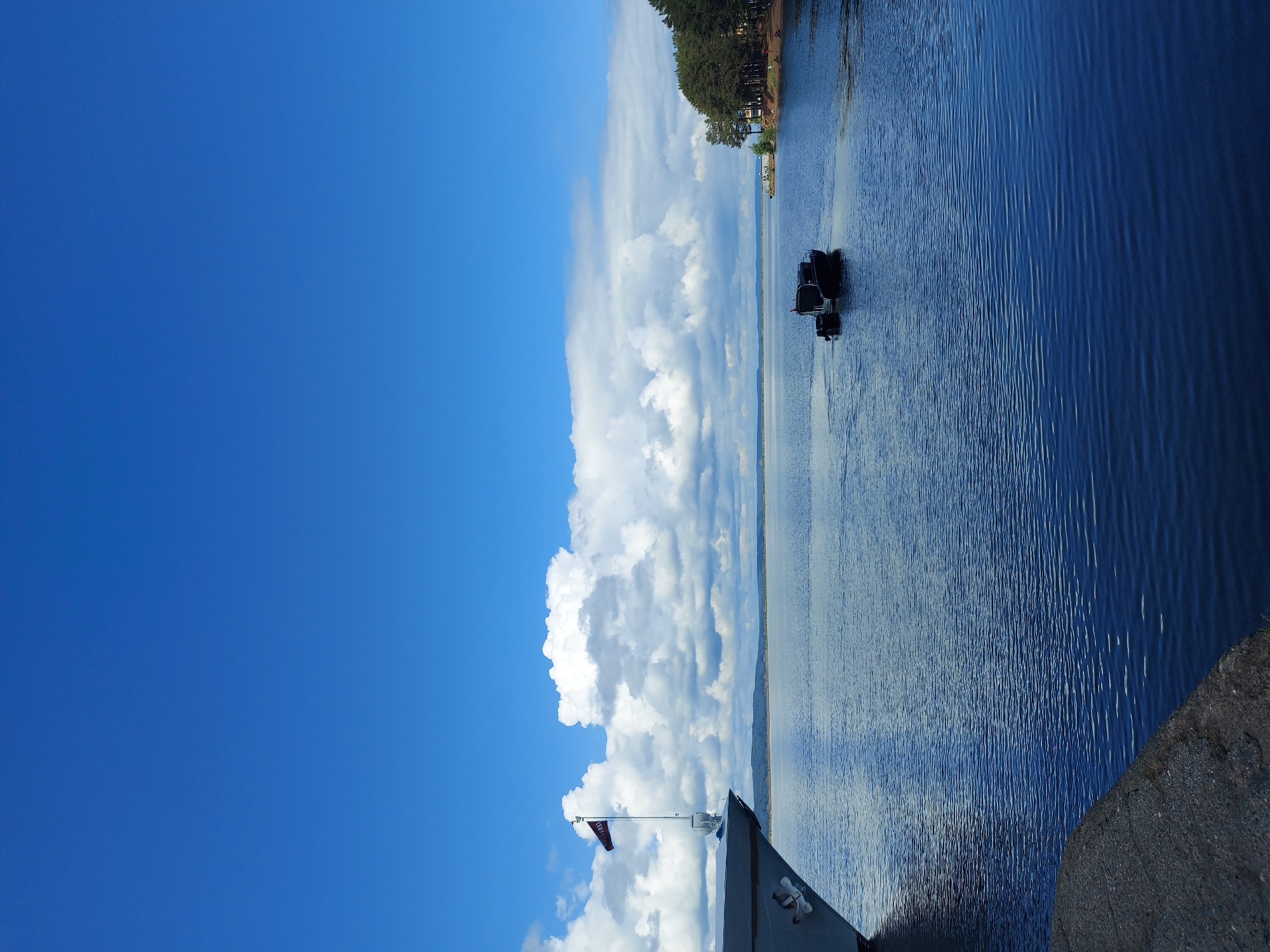 Tourist documents river cruise ships and waterfront in Chaikovsky, Russia