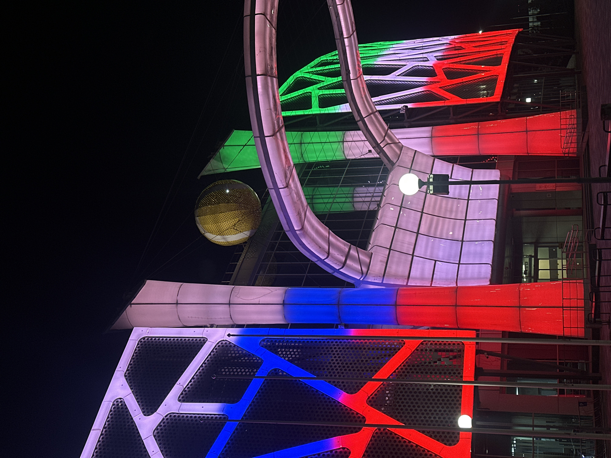 Kazan Family Center illuminated with colorful geometric light display
