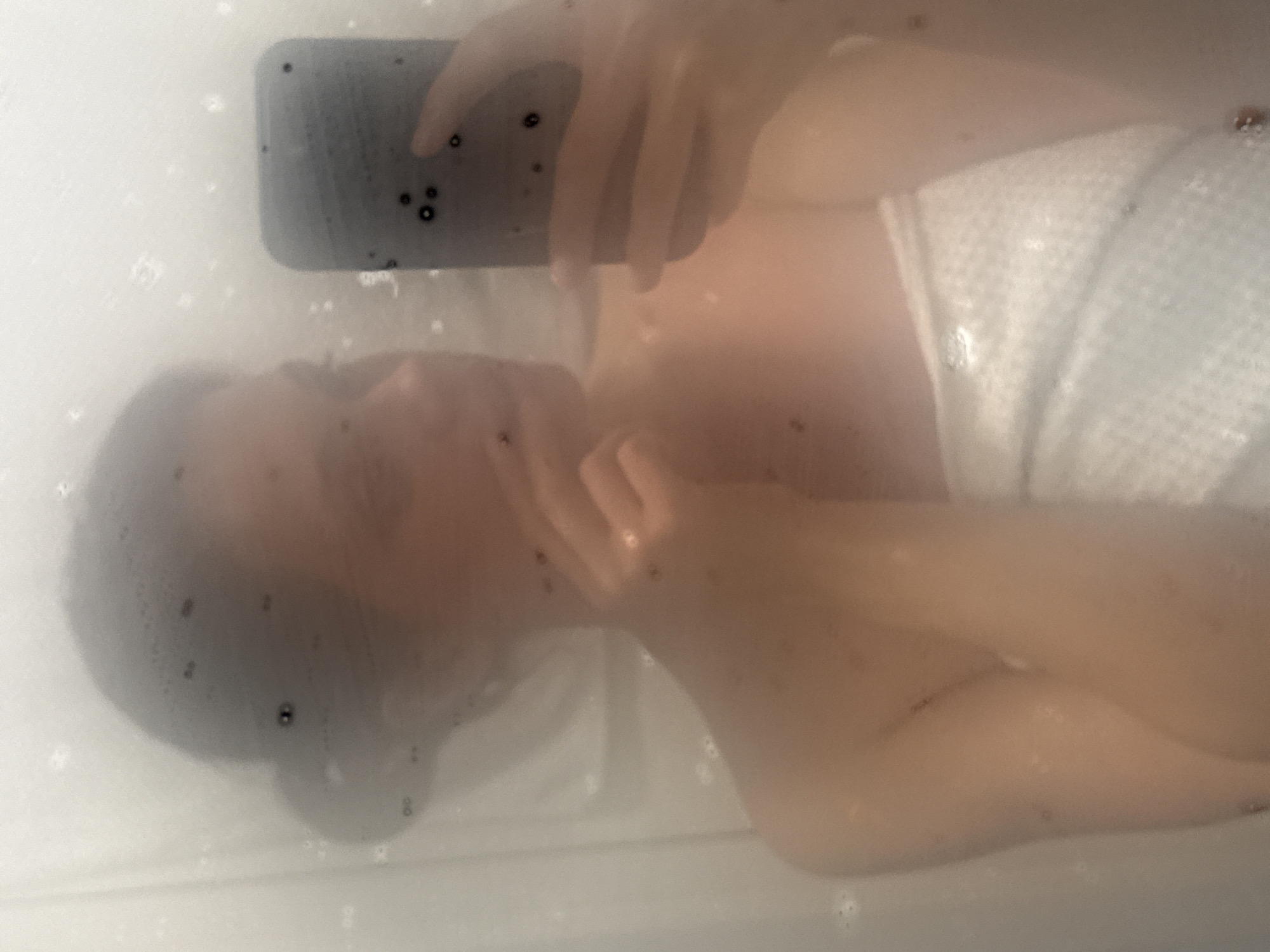 Woman takes indoor selfie in Kranj, Slovenia