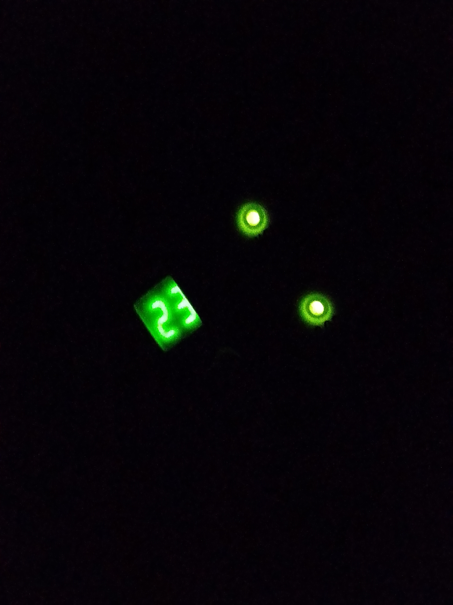 Green digital display showing '23' observed in Santa Ana