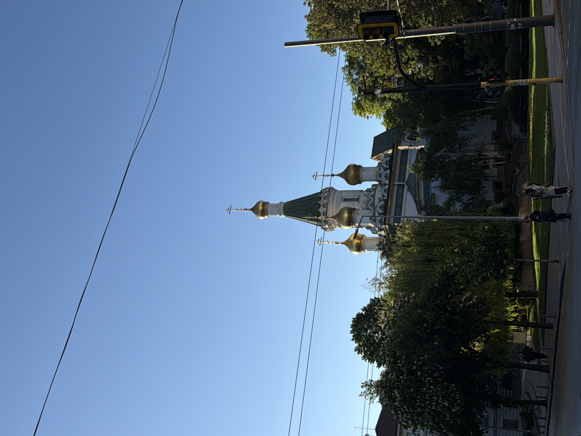 Street musician performs in Sofia square near historic landmarks