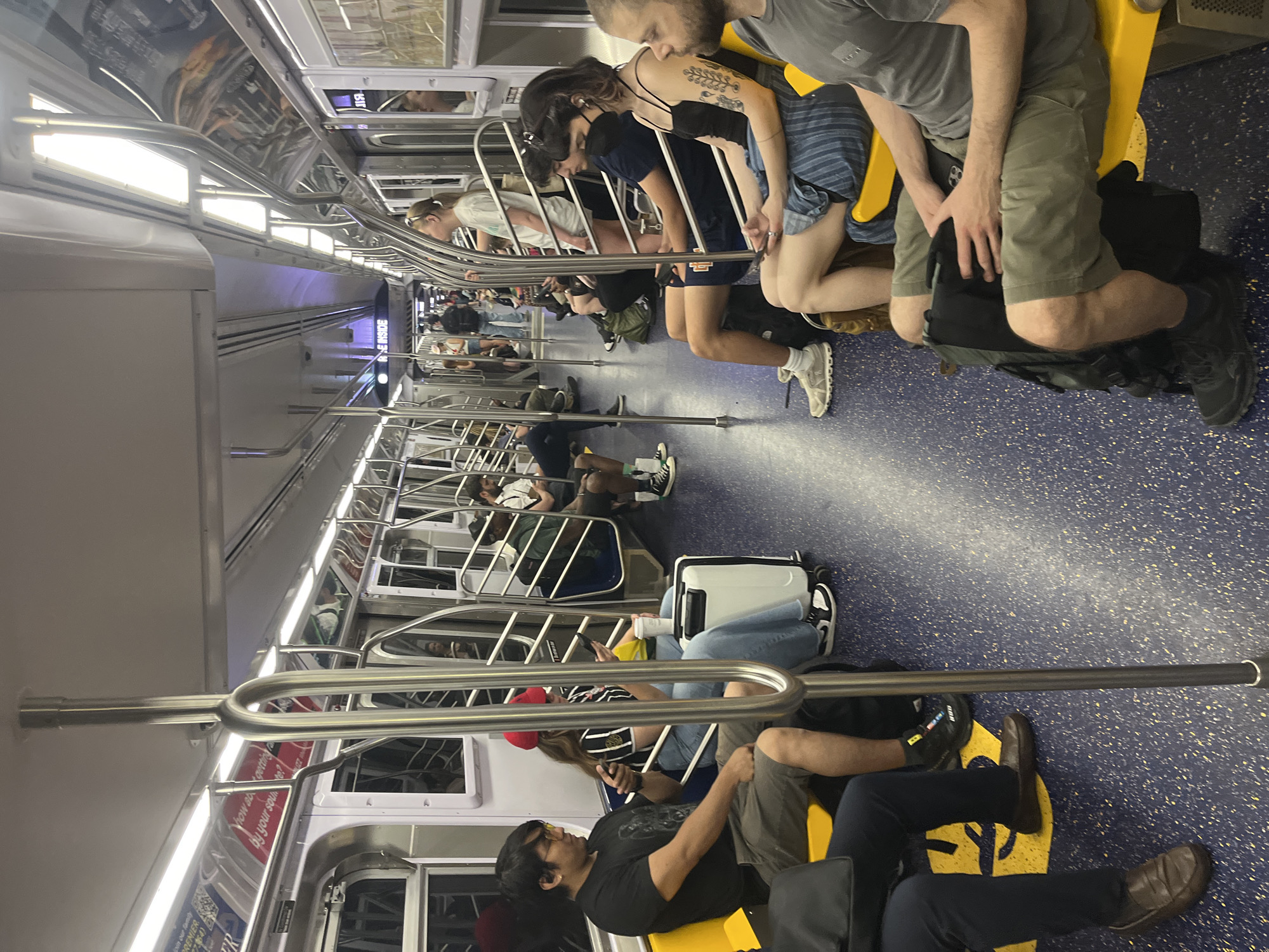 Riding the NYC subway through Metropolitan Avenue, Brooklyn