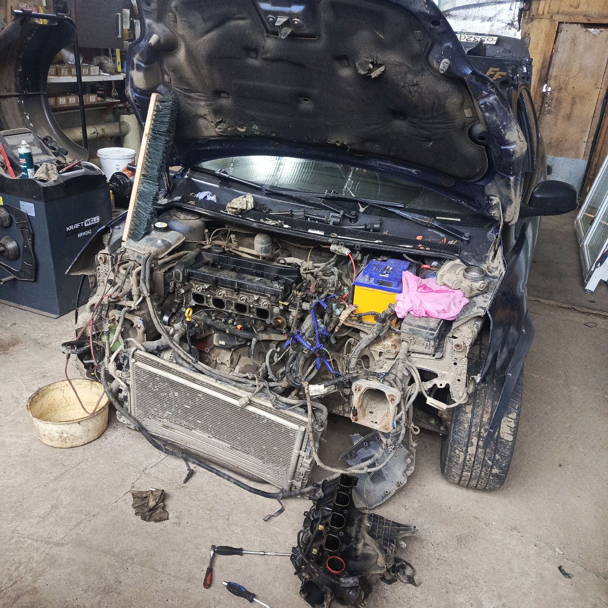 Car disassembled for repairs at Russian garage