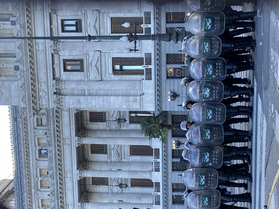 Buenos Aires protesters face riot police during labor reform demonstration
