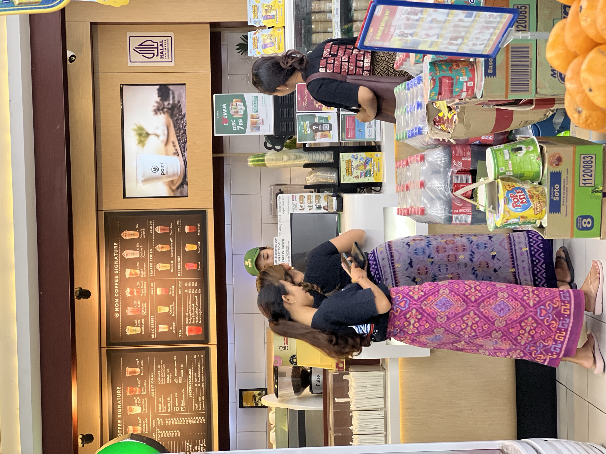 Customer shops at cafe convenience store in Celuk Indonesia