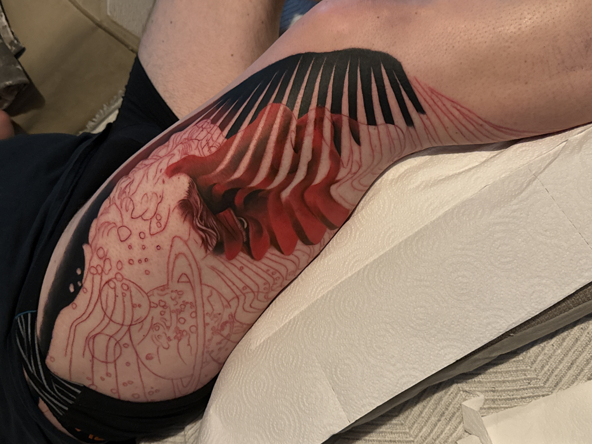 Tattoo session featuring planetary design documented in Lanzarote