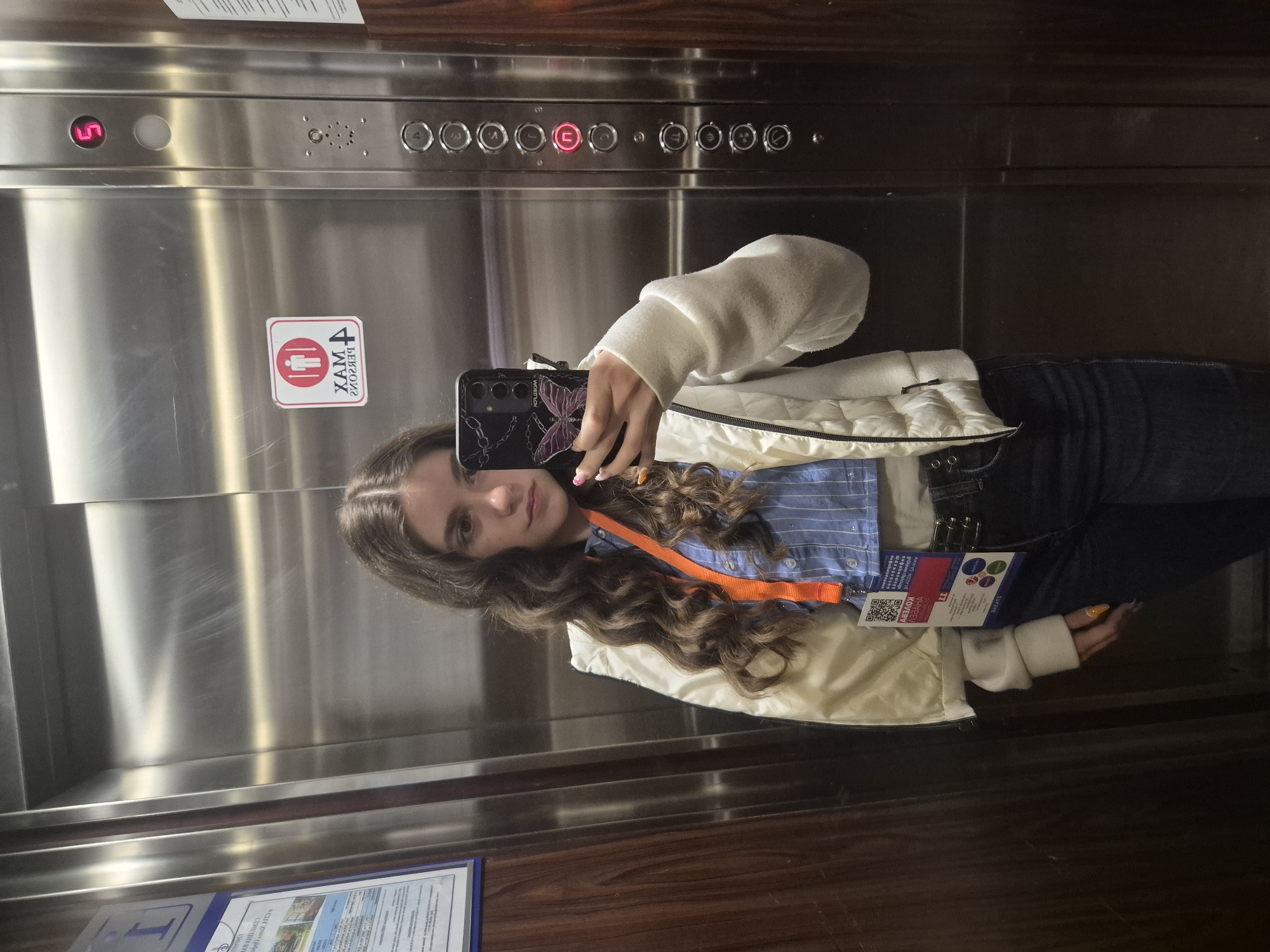 Woman takes selfie in elevator in Bulgarian town