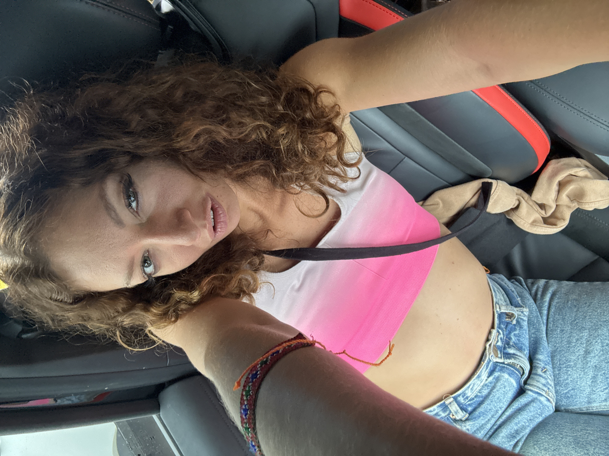 Woman takes car selfies near Buddhist statue in Binh Lu