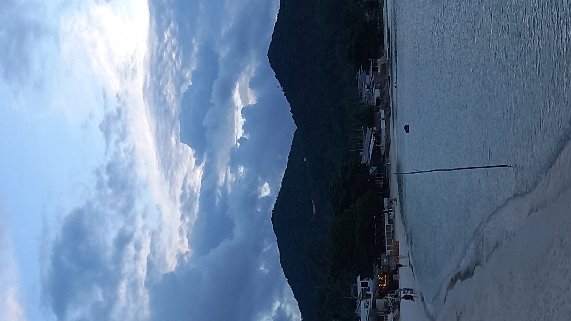 Overcast morning on Ko Pha-ngan: pier swimmers, coastal views, Coke delivery