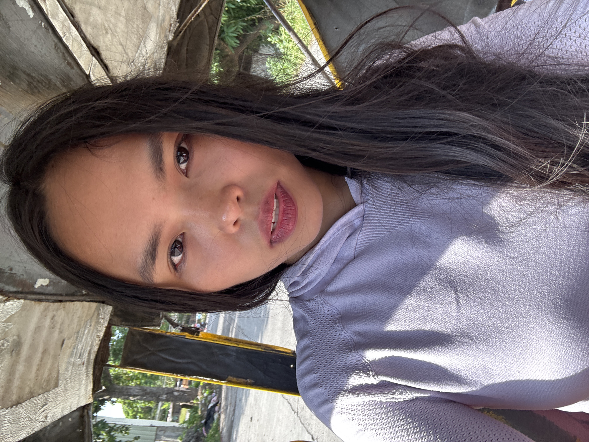 Woman takes selfies in tricycle, Davao City