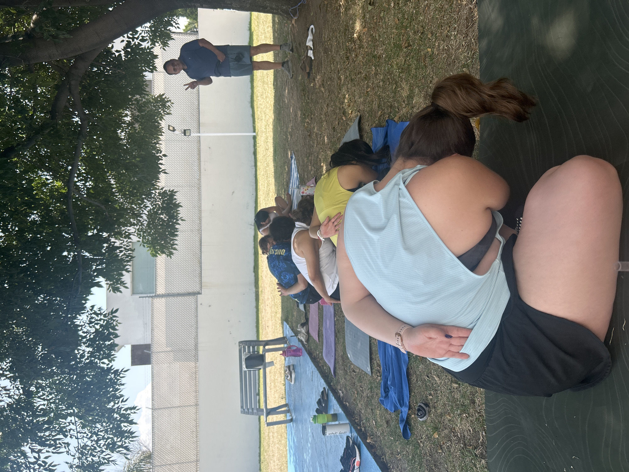 Outdoor yoga class held in Mexico neighborhood park