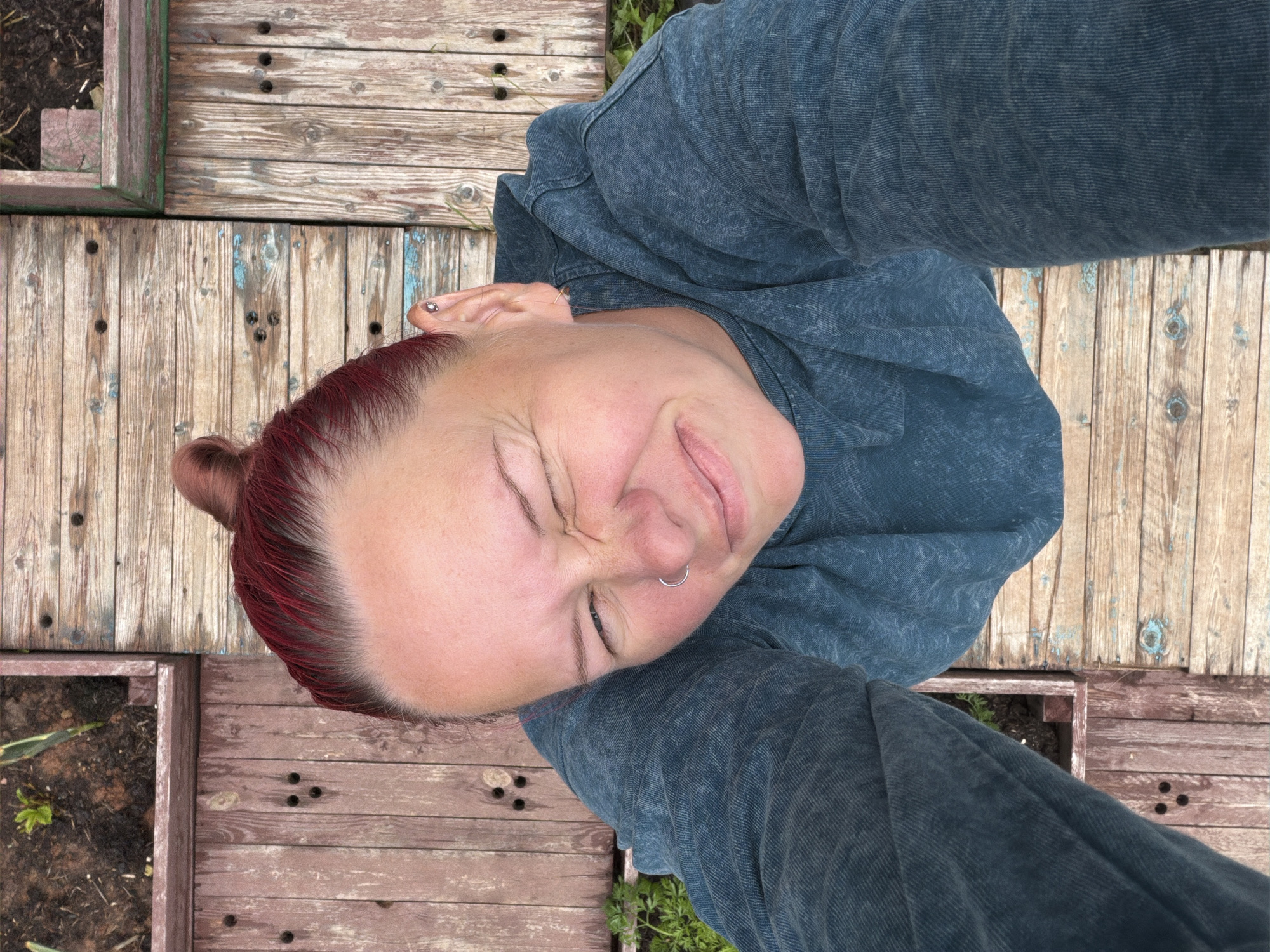 Storm clouds gather over Chaikovsky neighborhood, garden selfie alongside