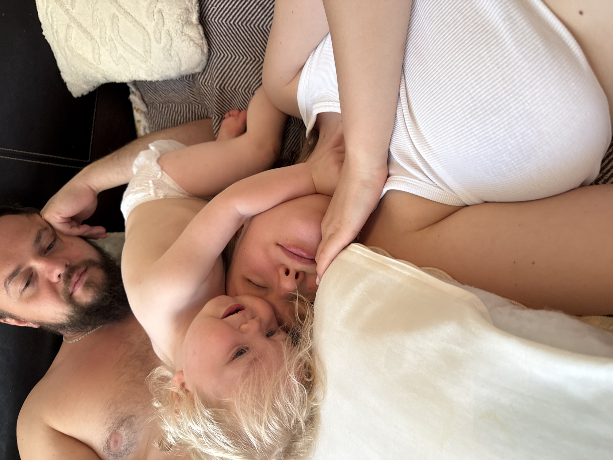 Lazy afternoon rest with a baby and stuffed toys at home
