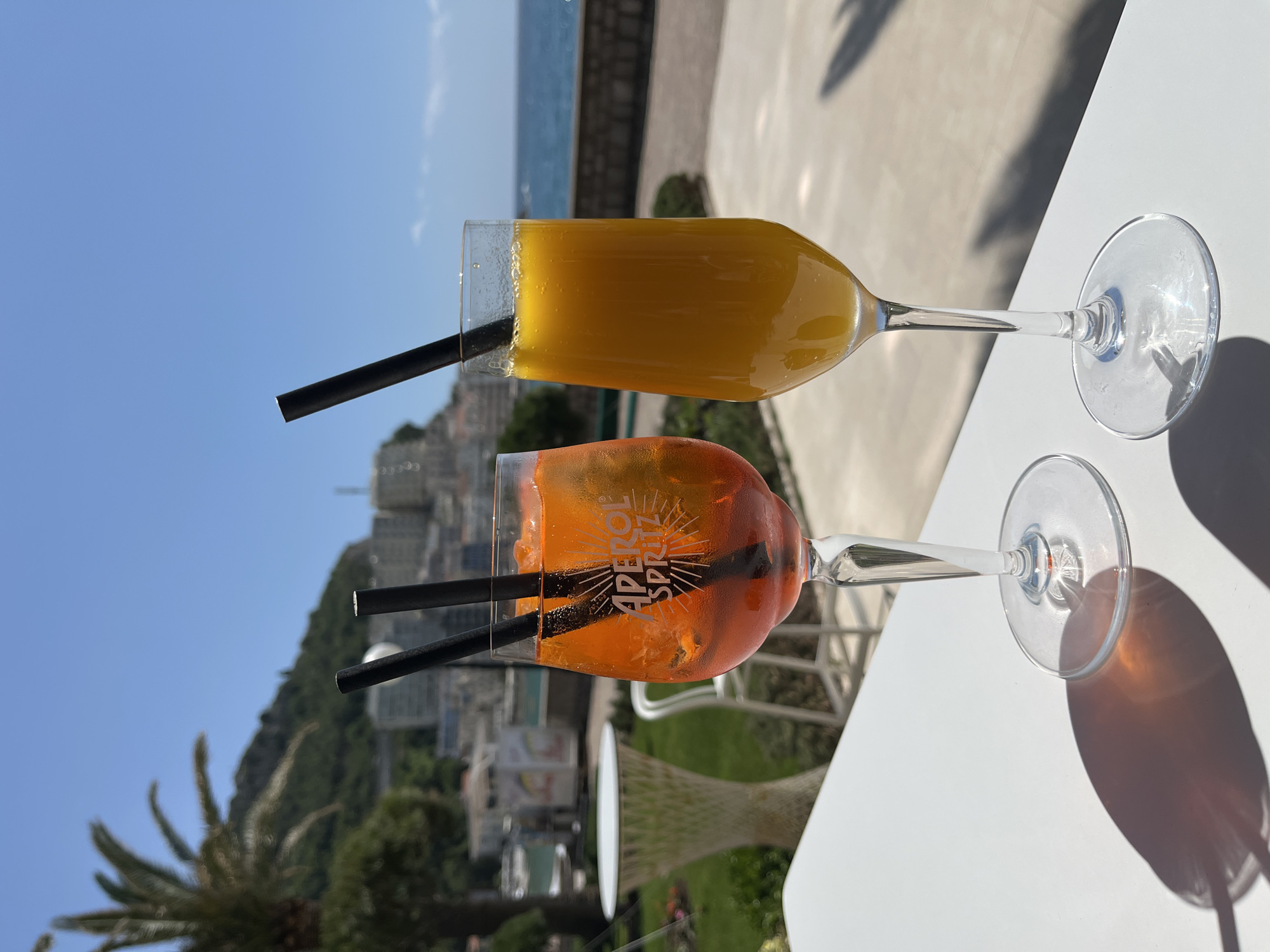 Cocktails enjoyed with scenic coastal view in Bečići, Montenegro
