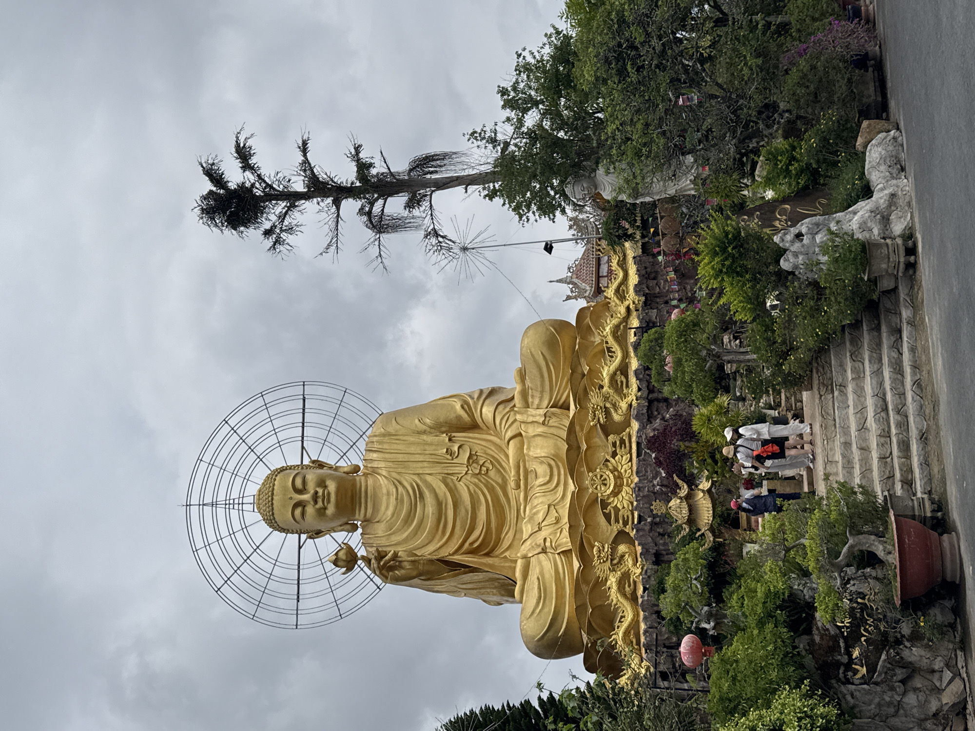 Visitor documents Buddhist temple complex in Đà Lạt, Vietnam