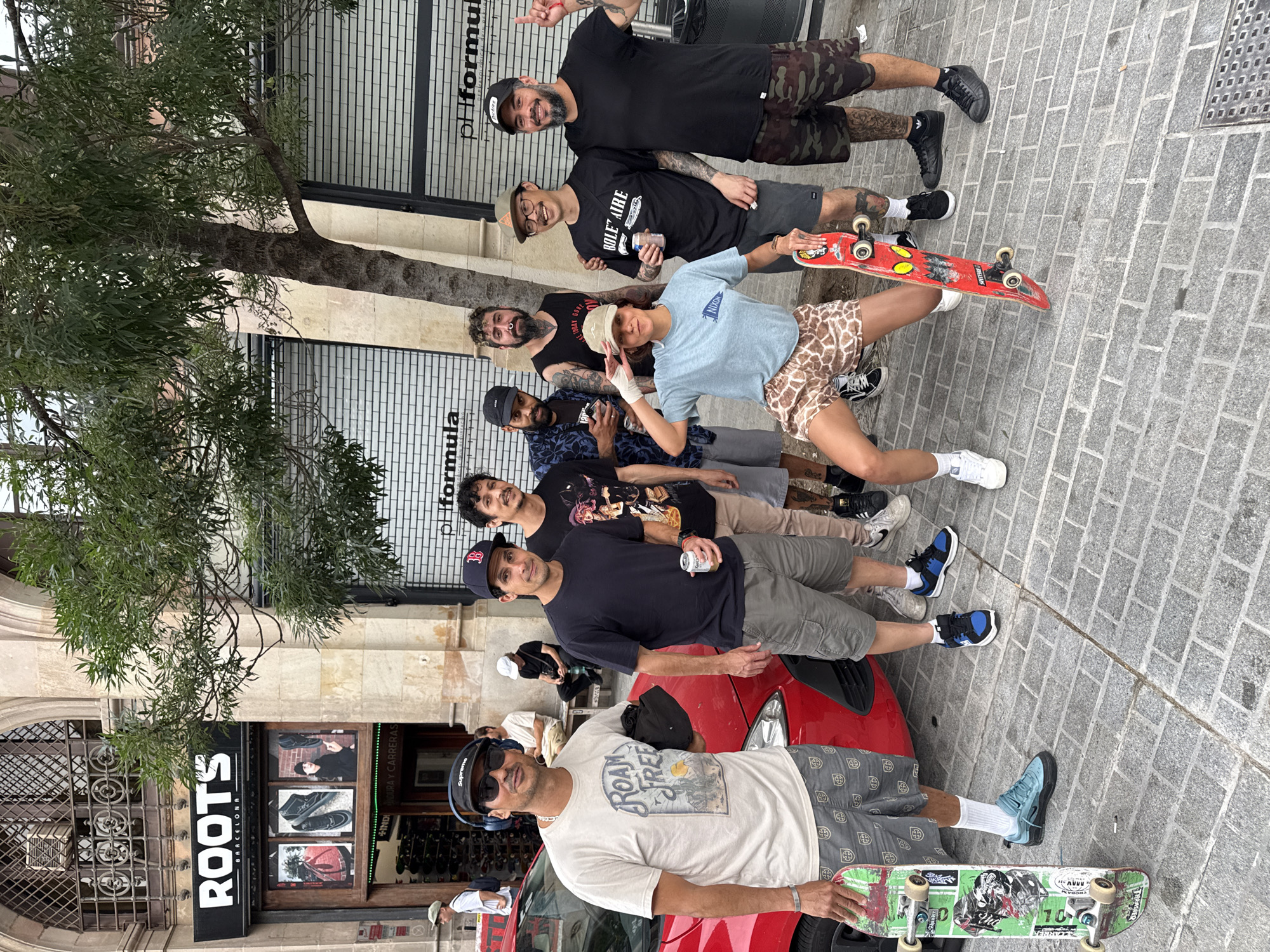 Skateboarding activities documented at ROOTS Barcelona shop and vicinity