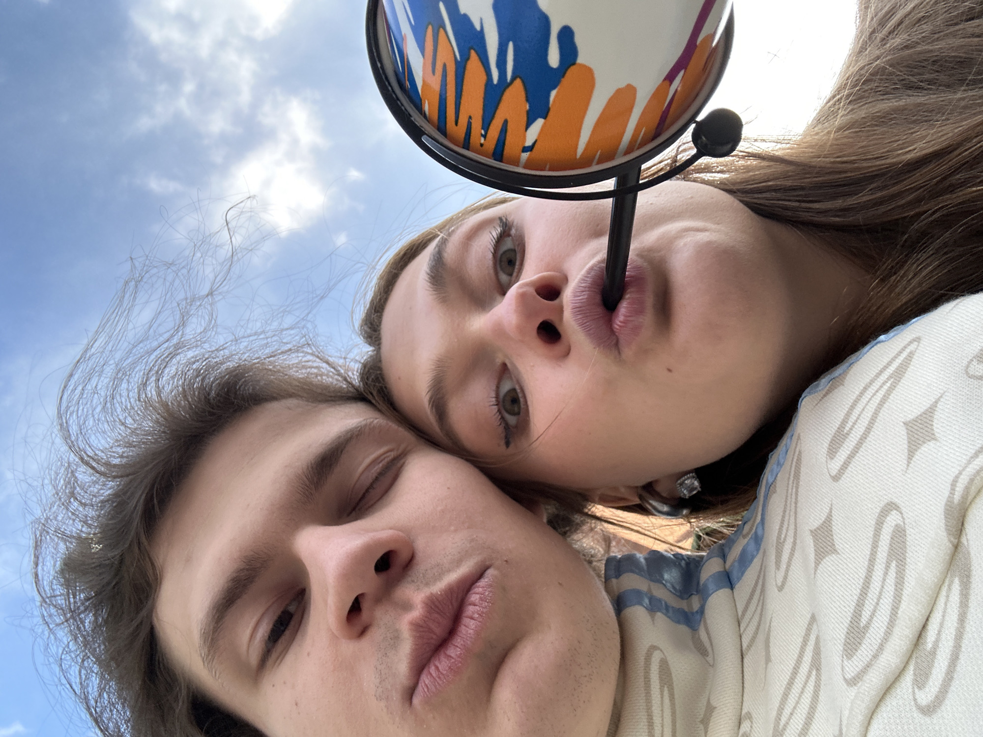 Woman photographed at multiple Krasnoyarsk landmarks during midday outing