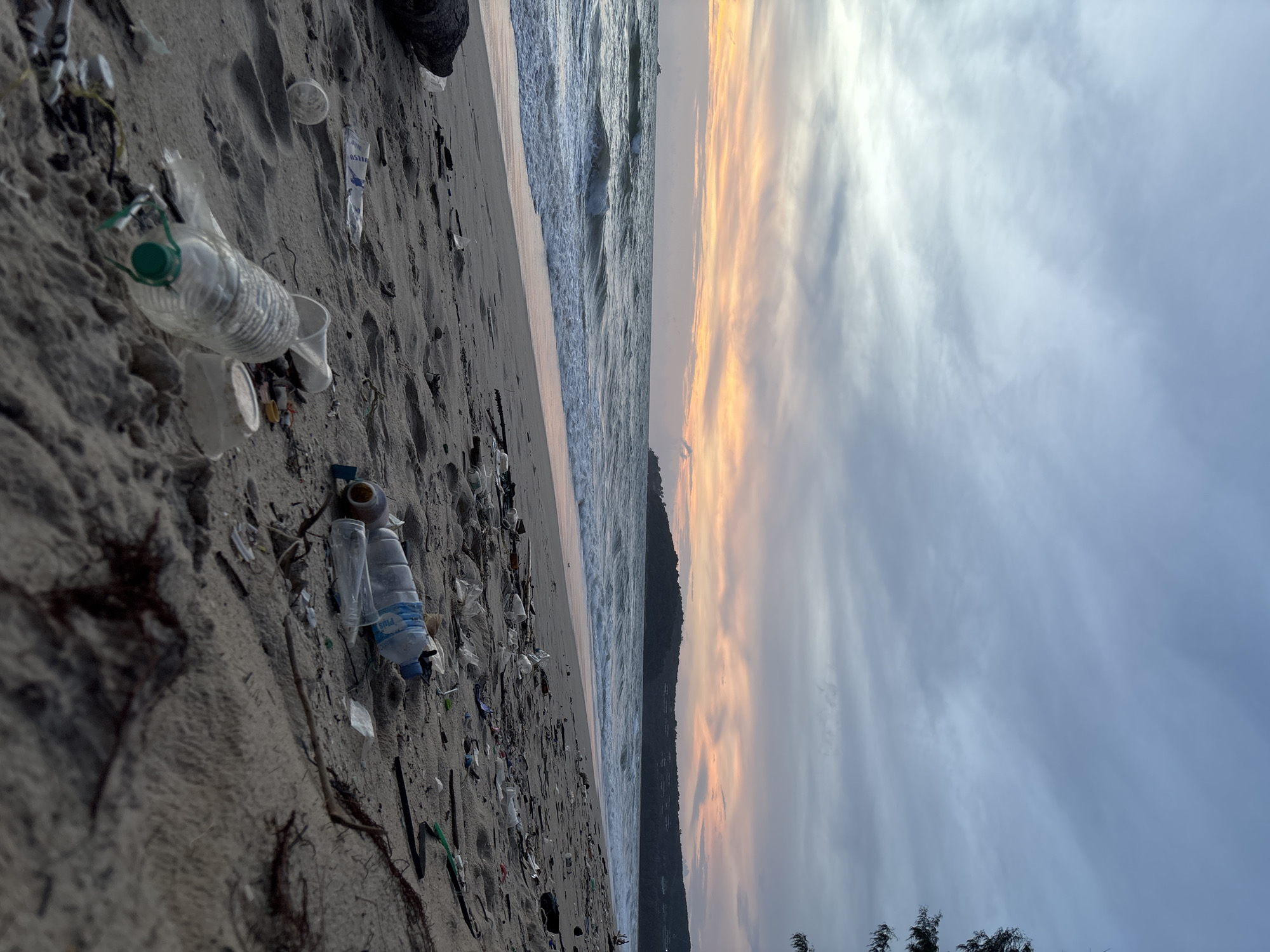 Choeng Thale beach shows pollution alongside scenic sunset horseback riding
