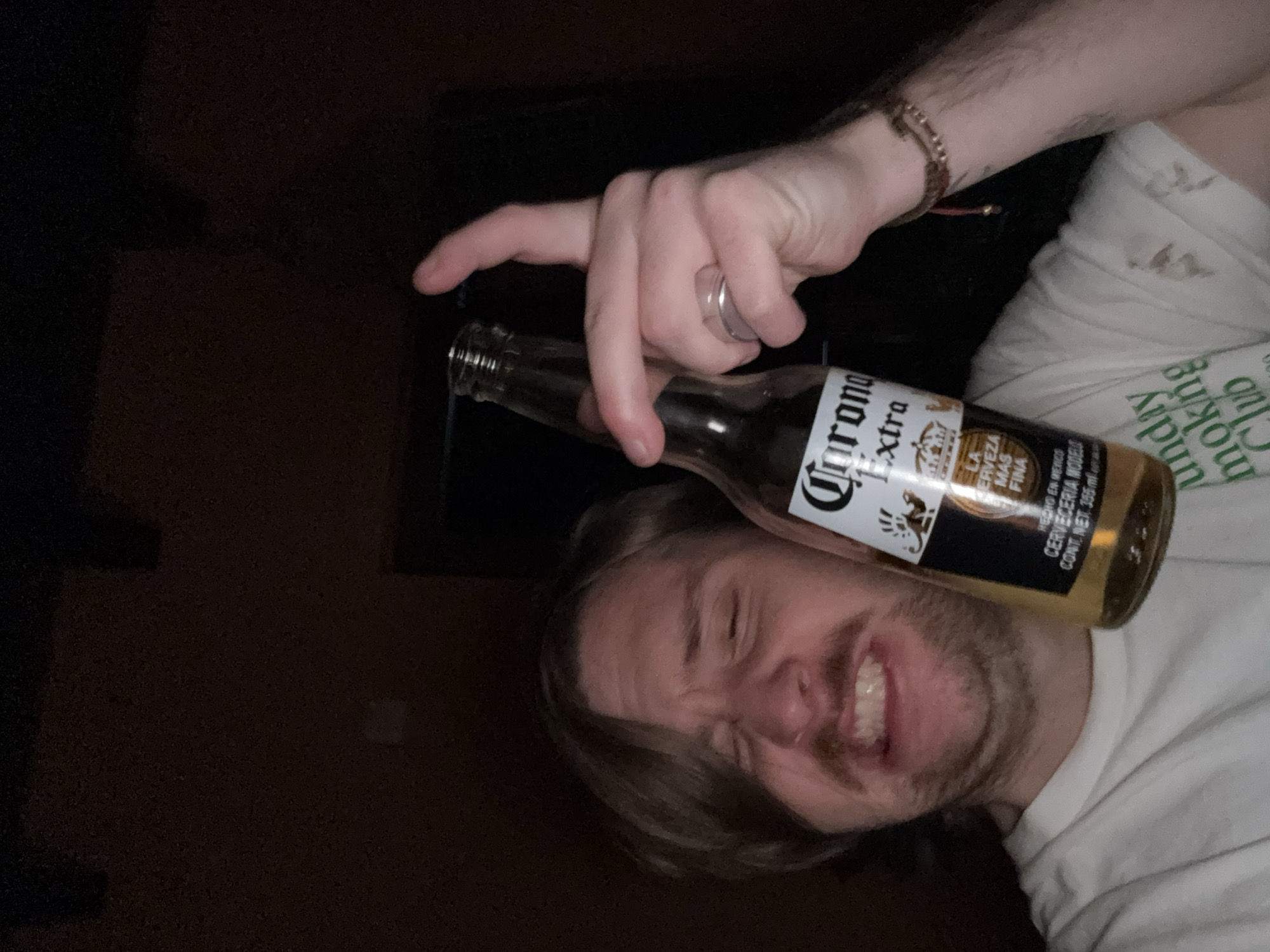 Person drinks Corona, takes selfies in Mexican home