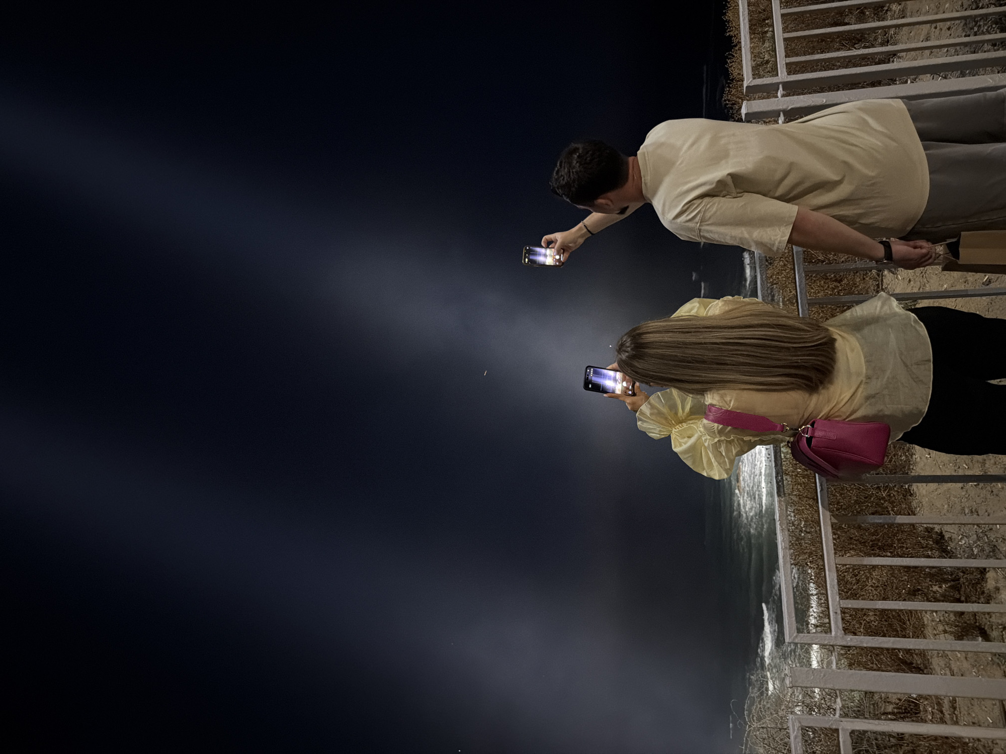 Foggy night on the Bat Yam coast, searchlights over the sea
