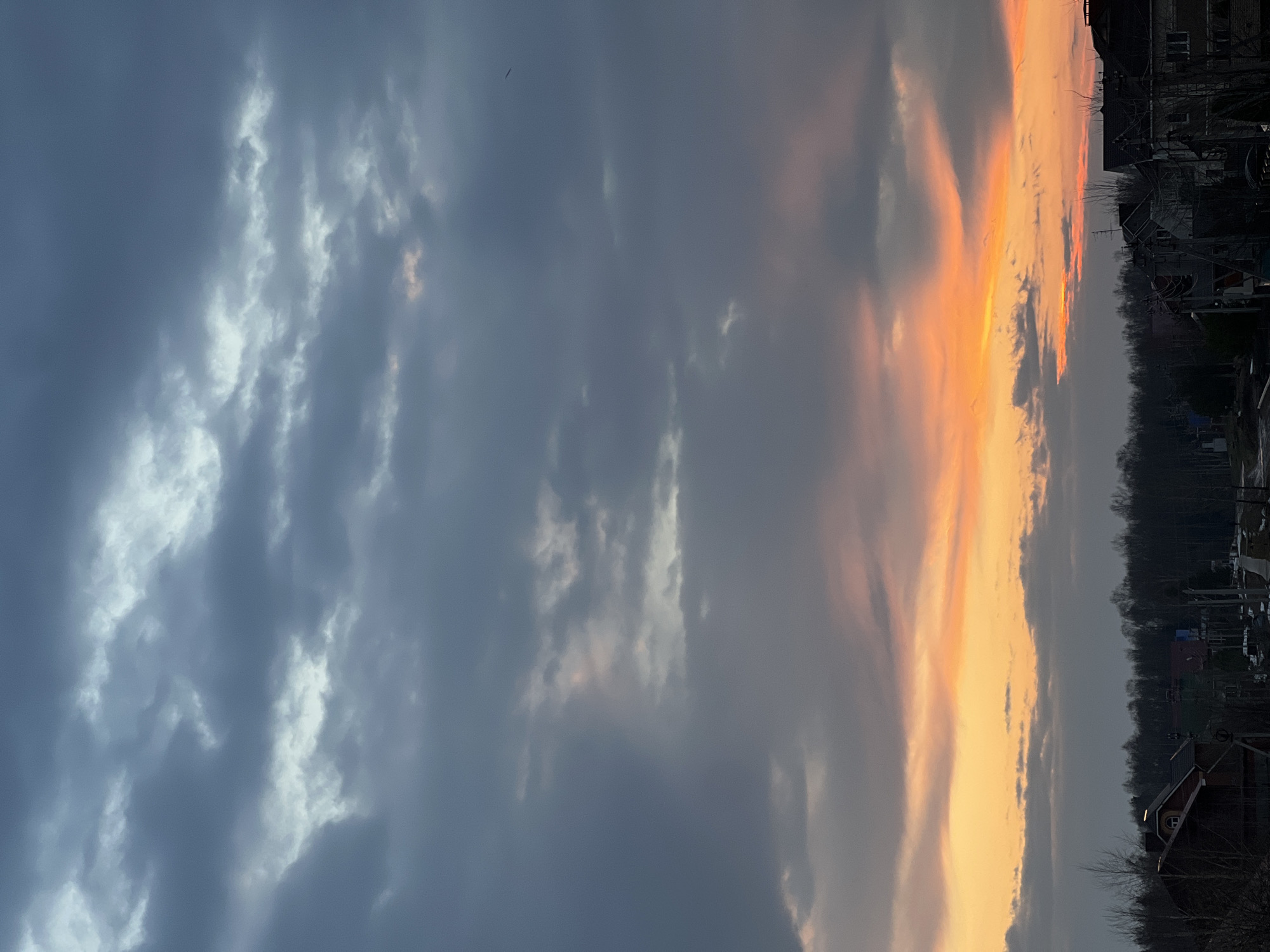Sunset documented through village streets in Noviy, Russia