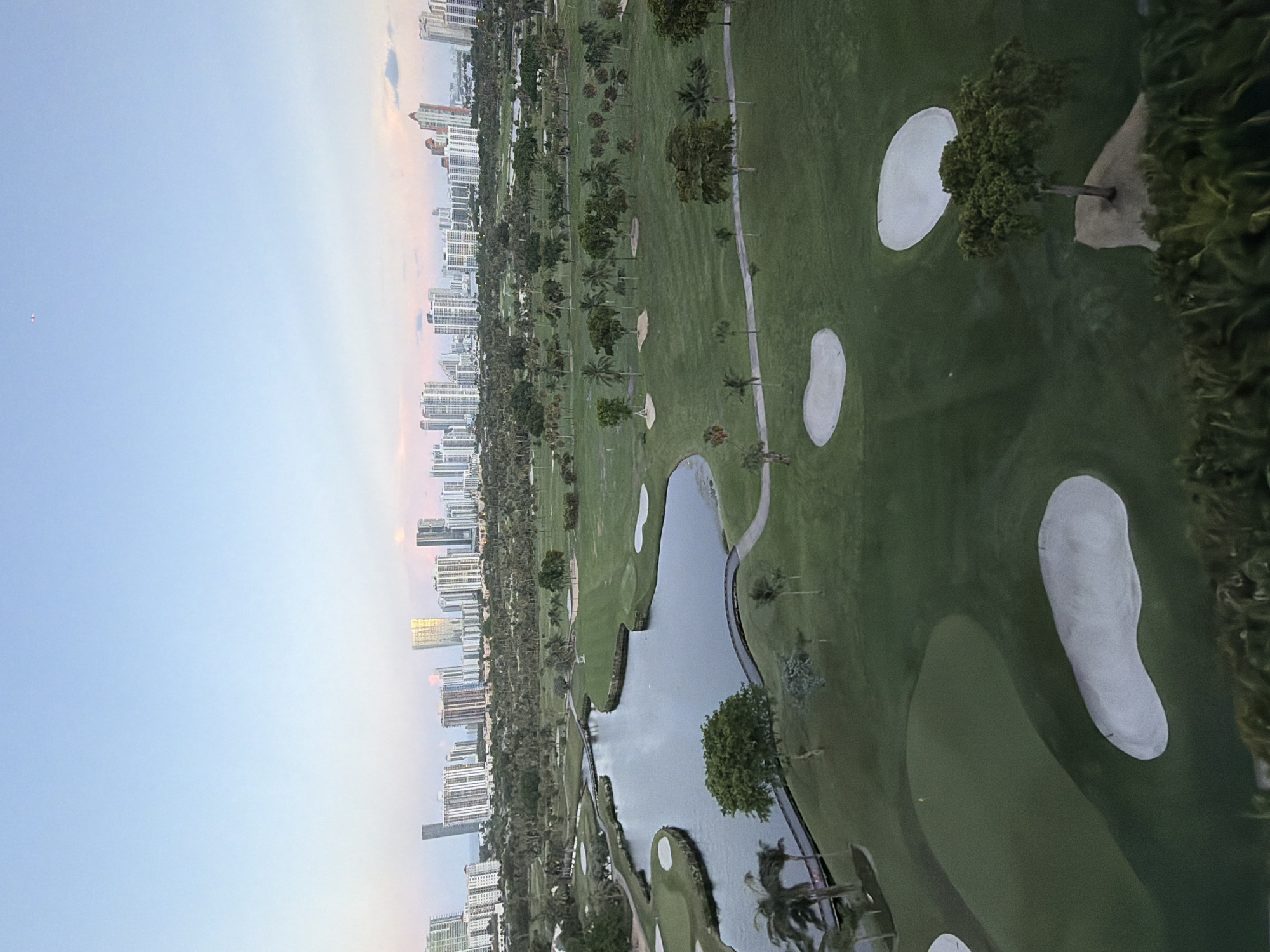 Aventura golf course from above, water and sand traps visible