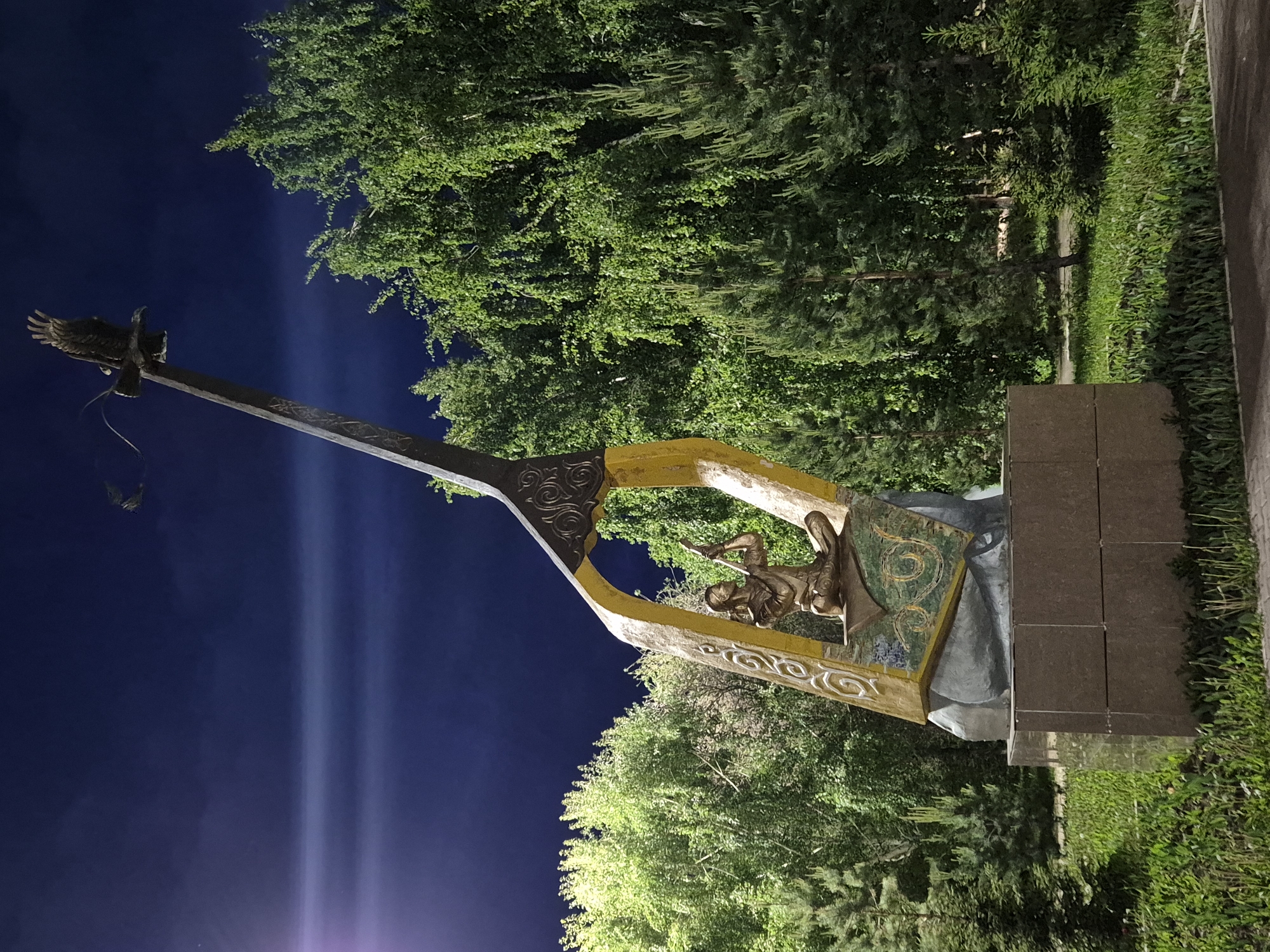 Eagle monument photographed at night in Kokshetau, Kazakhstan