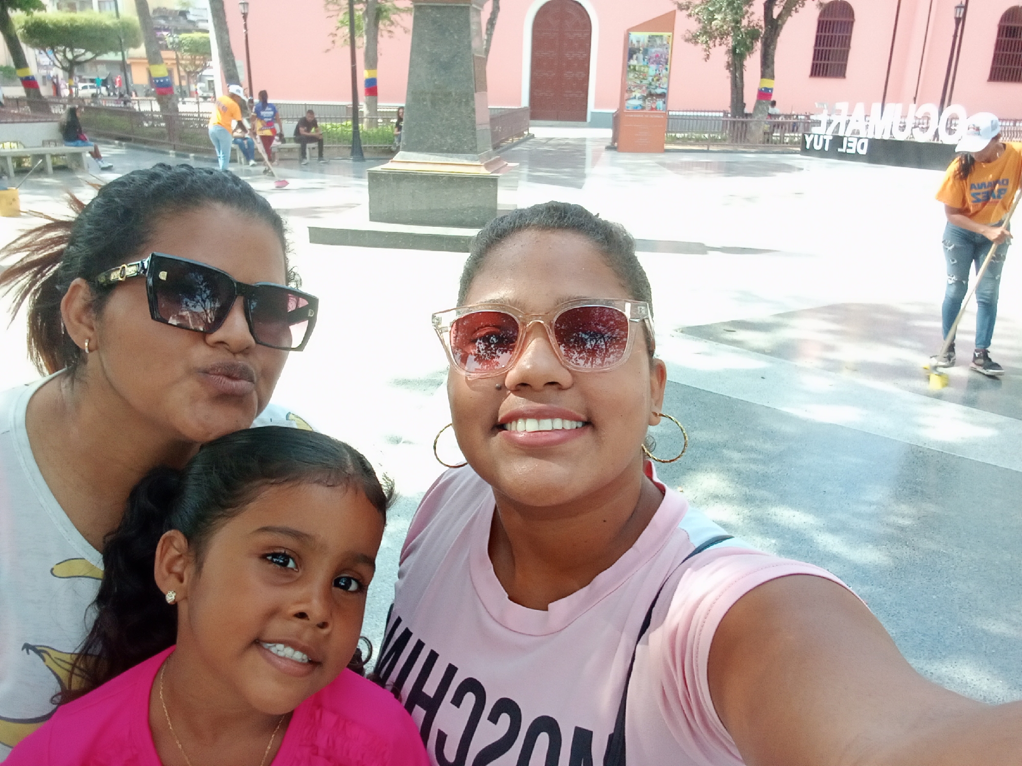 Family documents plaza visit with selfies in Ocumare, Venezuela