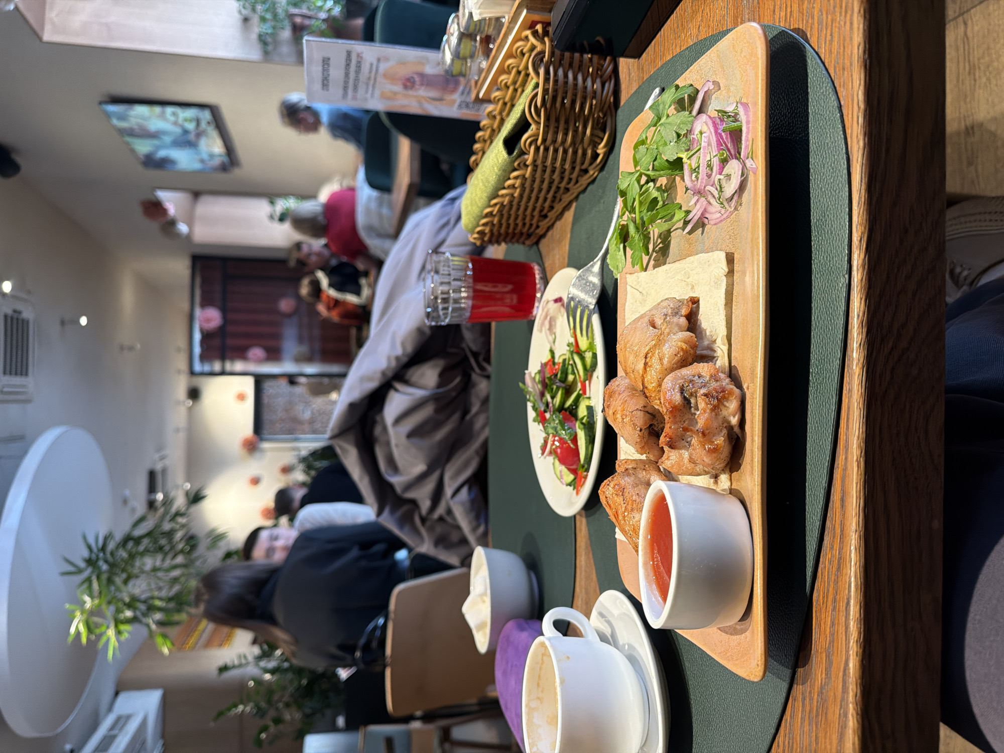 Diner documents restaurant meal and camera in Moscow